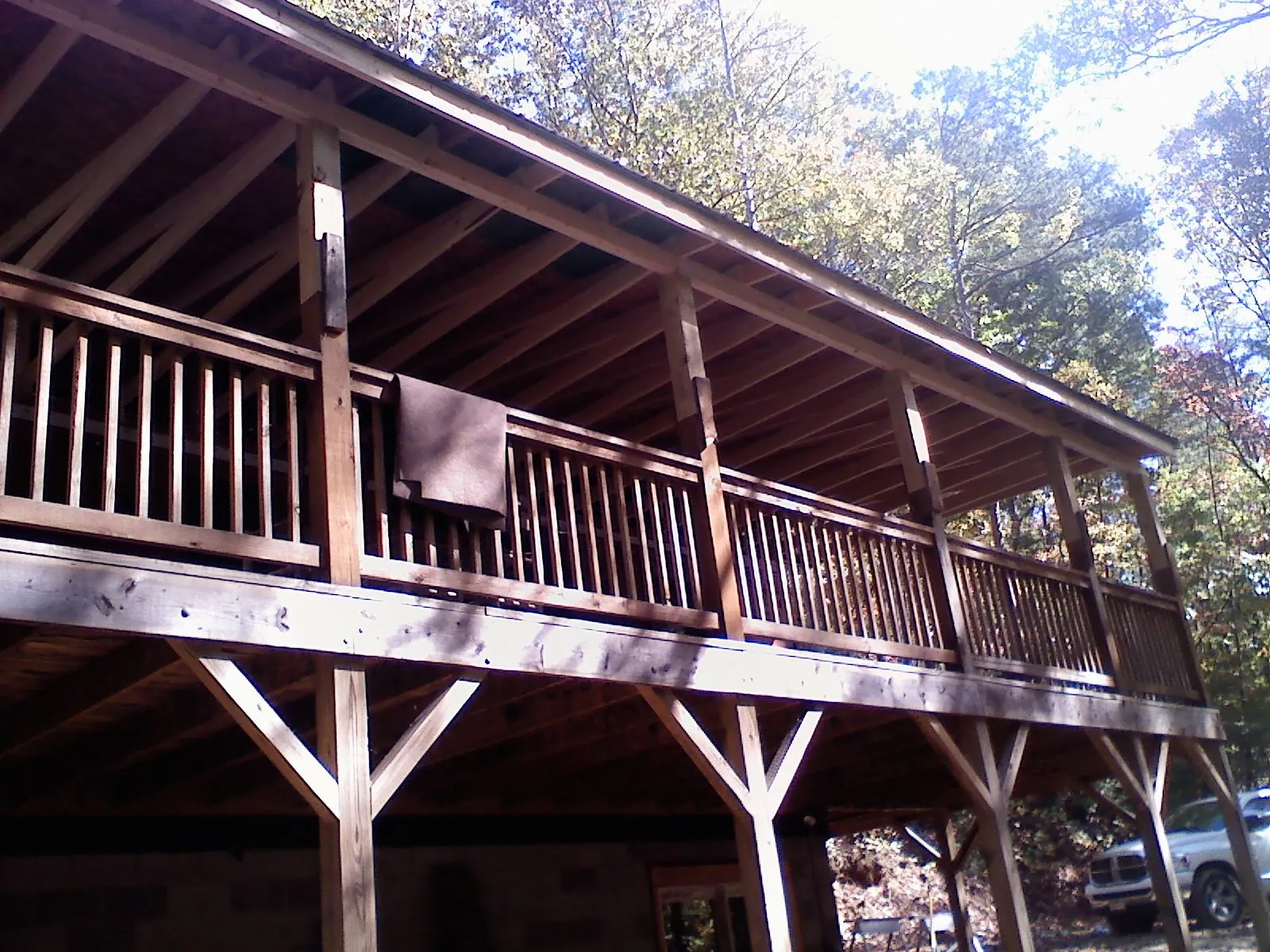 Timber framing under a new elevated porch and deck — Roof Leak Repair in Highmount by Roofing Brothers